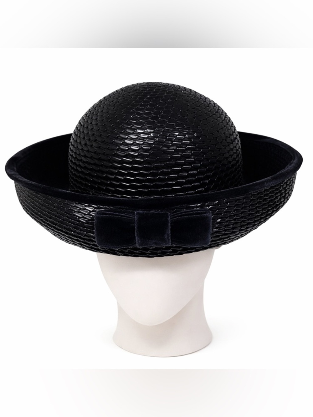 Vintage navy woven hat with velvet bow and trim.